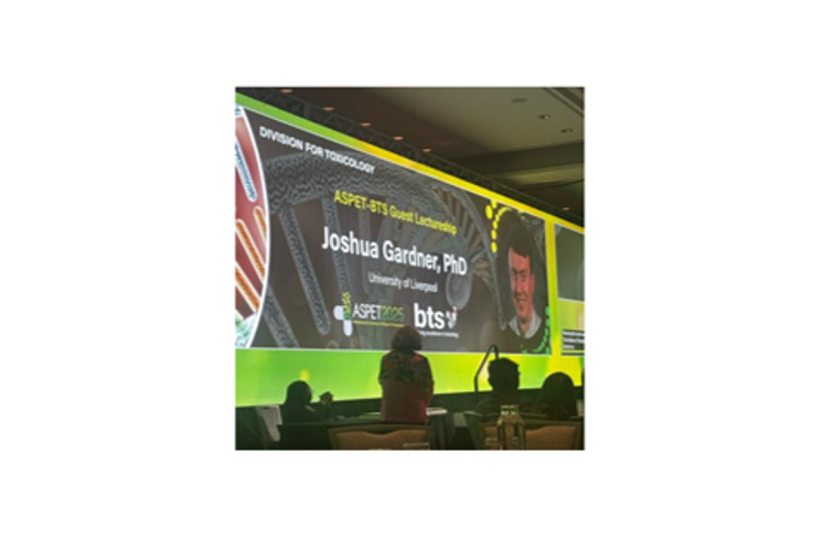 Image of a conference presentation by Joshua Gardner PhD